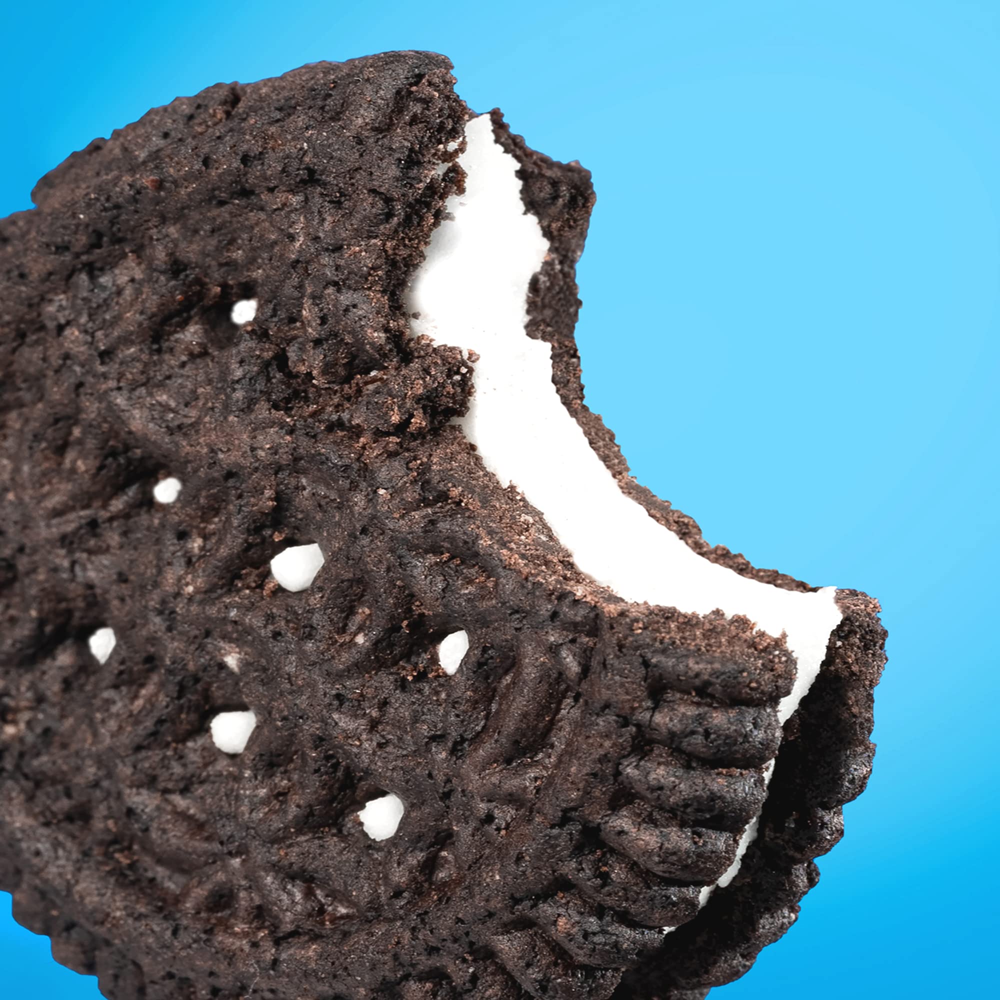 HighKey Keto Sandwich Cookies chocolate cream cross-section reveals rich cream between crisp chocolate cookies.