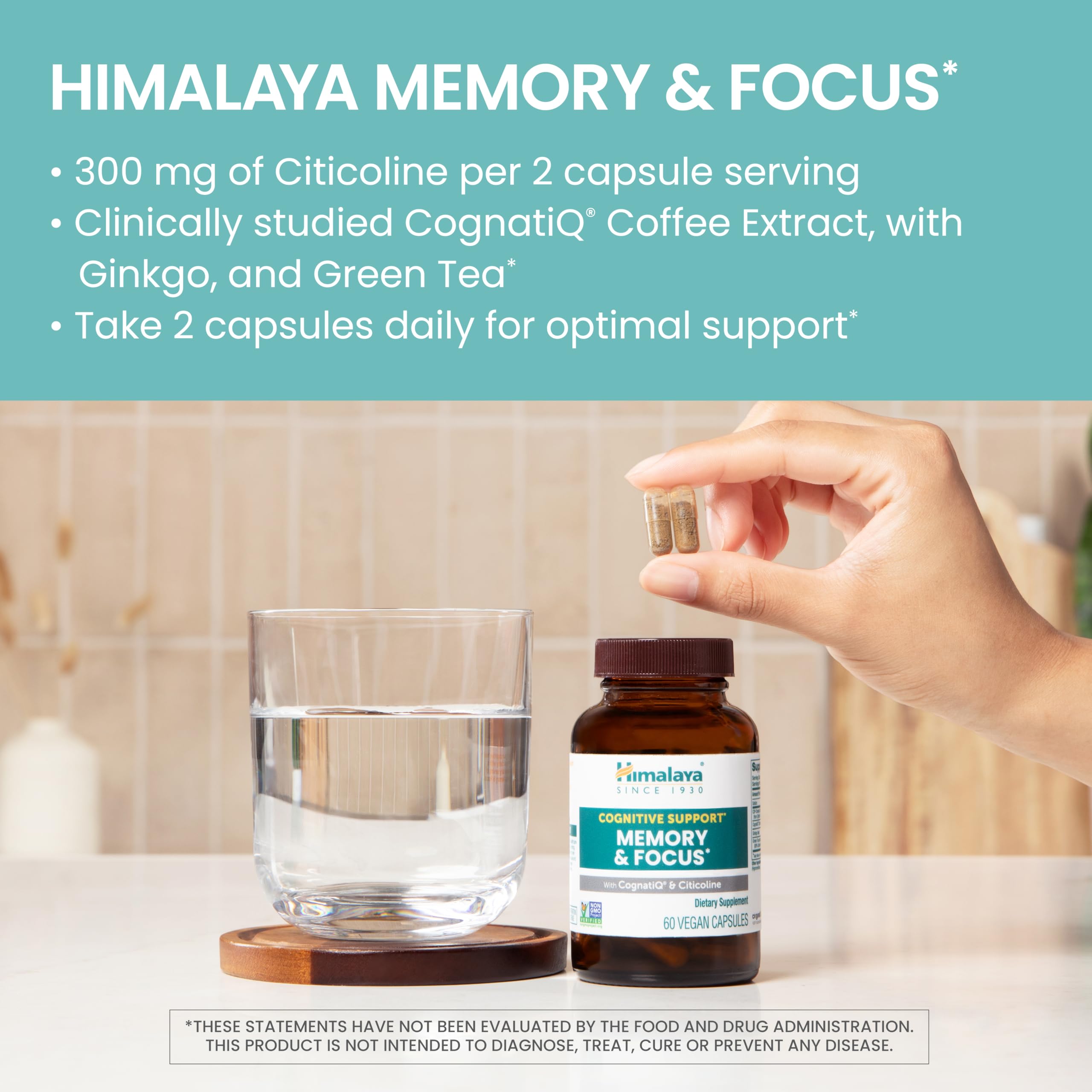 Himalaya Memory & Focus bottle on desk with glass of water.