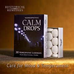 Historical Remedies Calm Drops vanilla lozenge held in hand for quick balance.