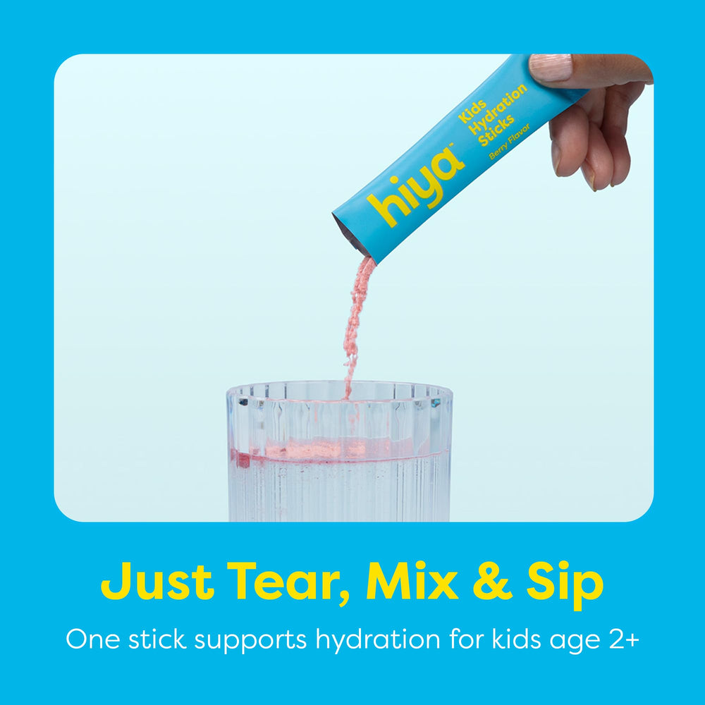 Kids sipping Hiya drink after practice for refreshing hydration.