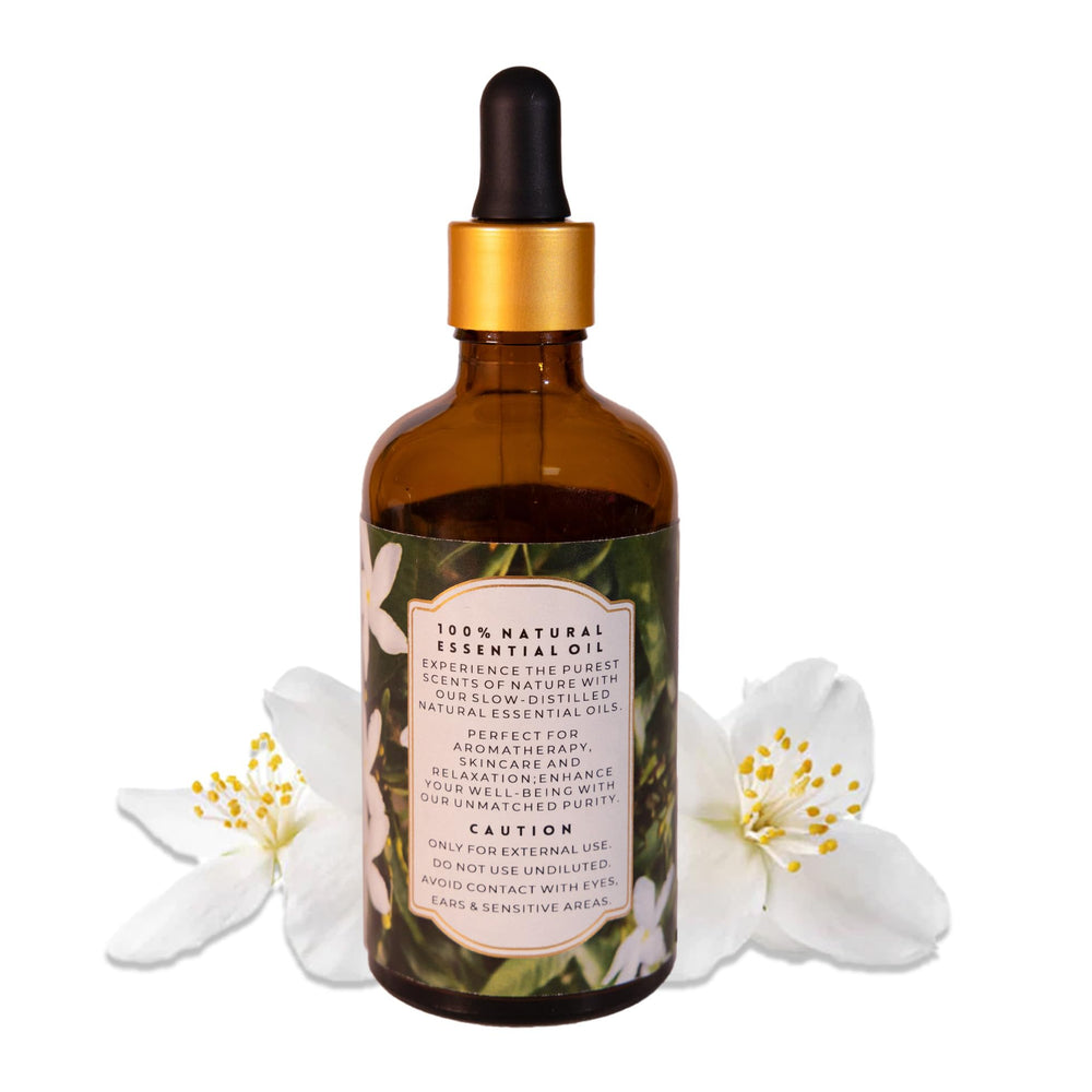 Homemade perfume base using jasmine oil for luxurious scent.