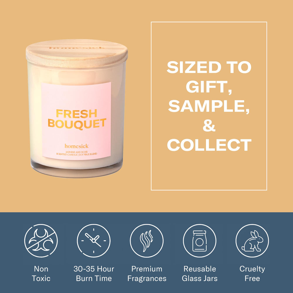 Candle on a dining table setting from Homesick Fresh Bouquet for cozy ambiance.