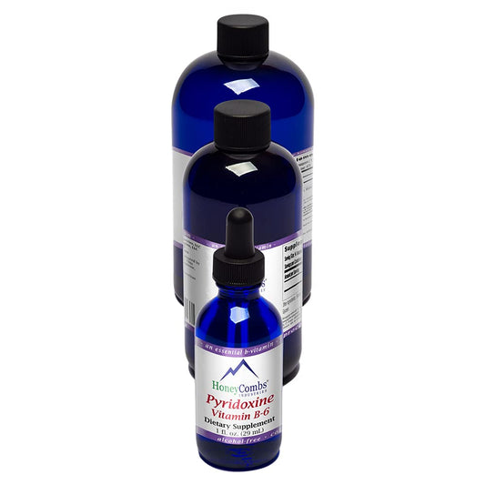 HoneyCombs Vitamin B6 Drops bottle being poured for energy support