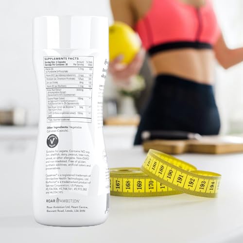 Hourglass Fit women-focused formula pills in hand.