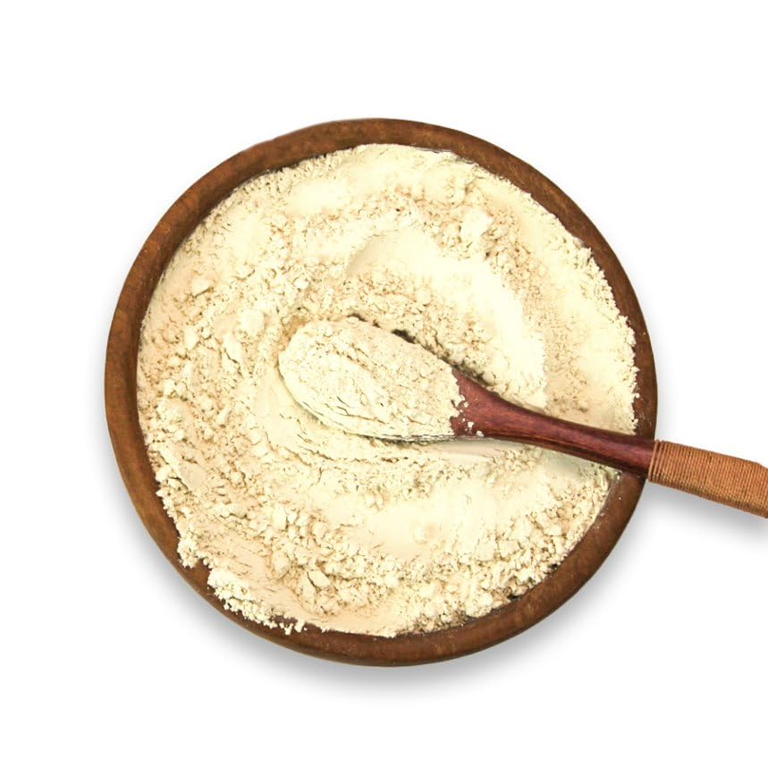 Hsu's ginseng powder in glass jar beside spices