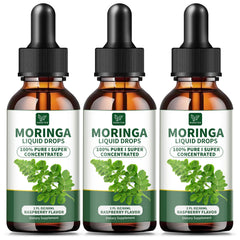 Hudetex Moringa Liquid Drops raspberry bottle on kitchen counter, supporting daily energy.