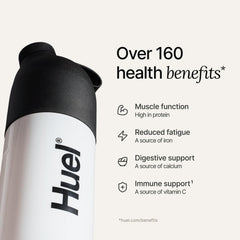 Huel Black Edition Cookies and Cream shake in glass demonstrates a quick on the go meal