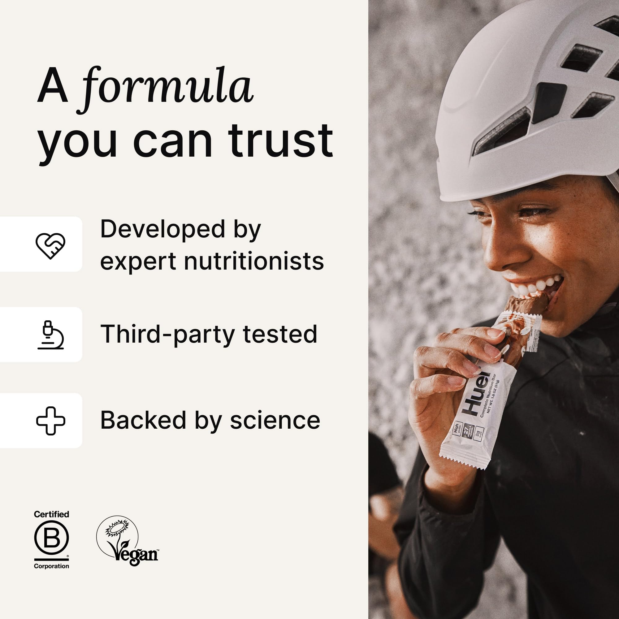 Huel Complete Nutrition bar viewed from the side, rich texture detail.