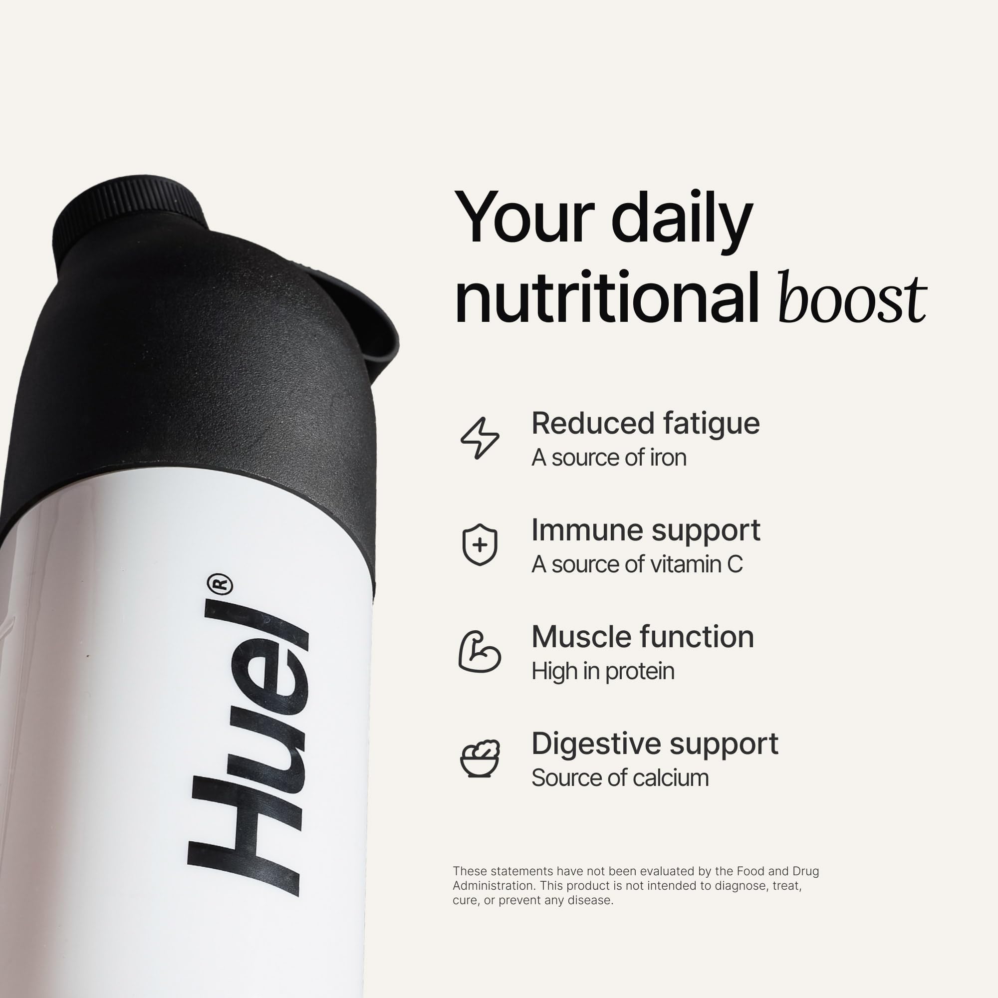 Huel shake in a glass after mixing, delivering smooth plant-based protein.