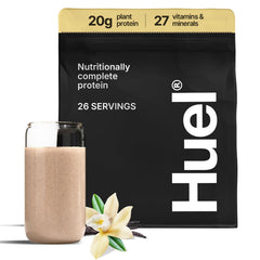 Huel Vanilla protein powder tub showing complete plant-based nutrition for daily fueling.