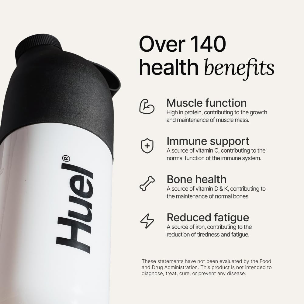 Huel vegan protein strawberry shaker — mix with water or milk for smooth texture.