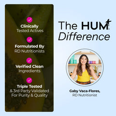 Capsules in hand from HUM Collagen Love Skin for daily use