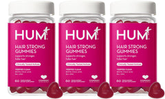 HUM Hair Strong Gummies bottle front for daily hair support in a simple routine.