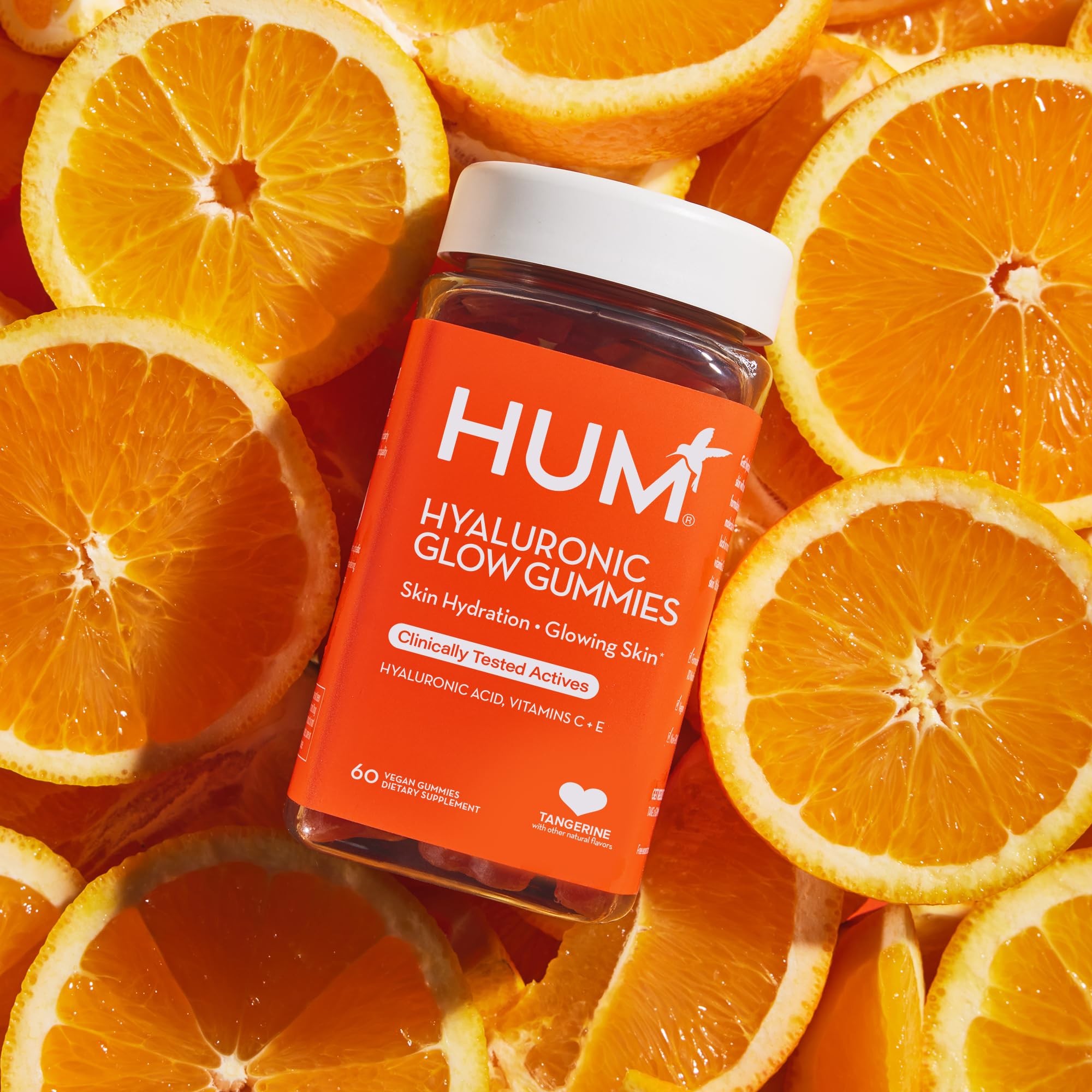 HUM Hyaluronic Glow bottle with dosage guidance for two gummies