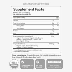HumanN HeartGreens canister beside apples and berries demonstrating flavor sources and serving scale
