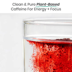 Humann SuperBeets Energy Plus prepared drink in a glass with berry flavor.