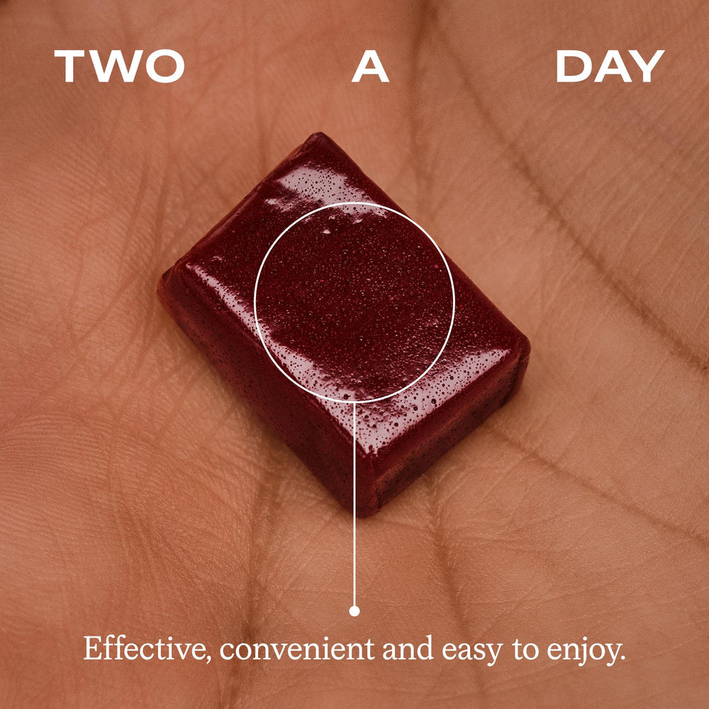 Humann packaging box sits beside a glass, ready for daily routines.