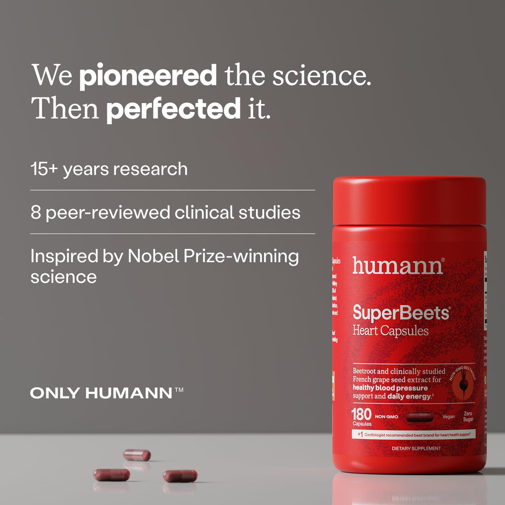 Humann SuperBeets serving with glass of water, sugar-free capsules.