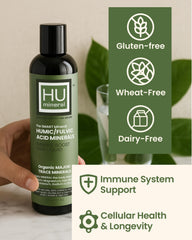 Glass of water with Humineral for daily vitality and focus