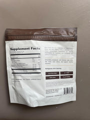 Label close-up showing ashwagandha and cacao ingredients.