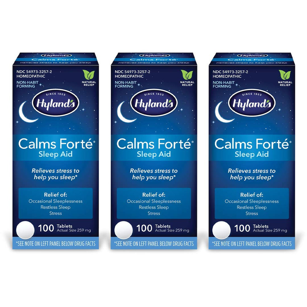 Hyland's Calms Forte sleep aid bottle on nightstand showing natural relief for occasional sleeplessness