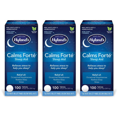 Hyland's Calms Forte sleep aid bottle on nightstand showing natural relief for occasional sleeplessness