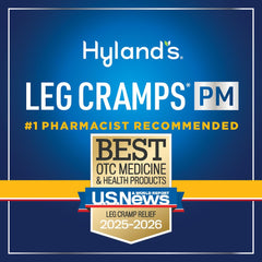 Hyland's Leg Cramps PM bottle beside a sleeping setup, no water needed