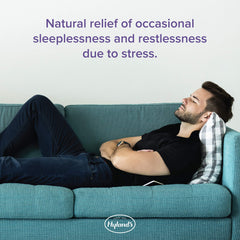 Hyland's Rest tablets close-up, quick-dissolving relief for calmer nights