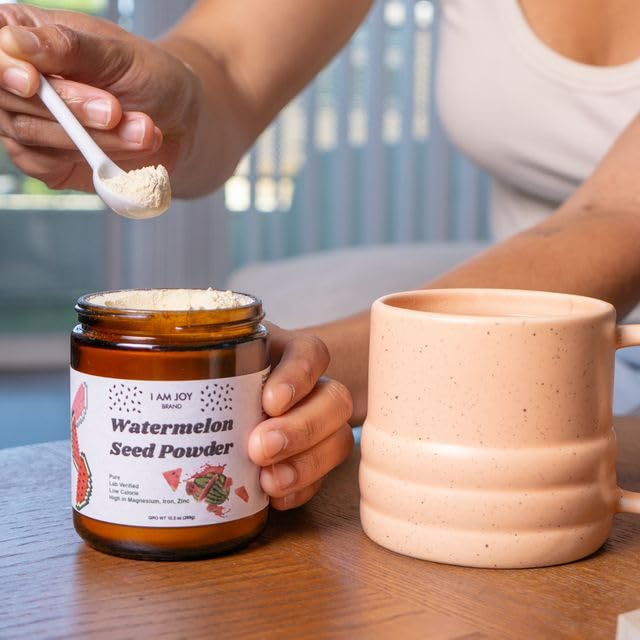 I Am Joy Co. Watermelon Seed Protein Powder stirred into tea for a gentle energy boost.