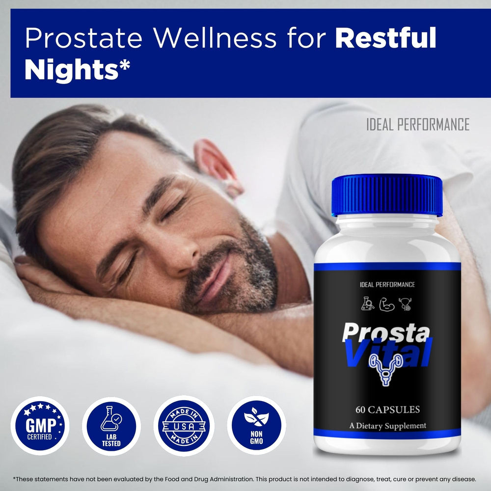 IDEAL PERFORMANCE ProstaVital capsules on wooden desk with soft lighting.