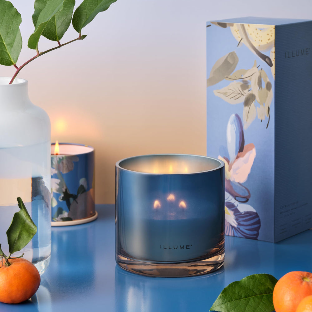 Illume Citrus Crush diffuser in a cozy corner creating inviting ambiance.