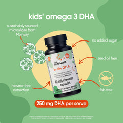 Close-up of Brain DHA capsules with a liquid burst and natural orange flavor.