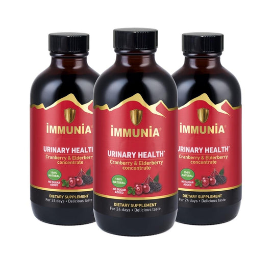 Immunia cranberry-elderberry concentrate bottle close-up showing natural ingredients for daily urinary health support.