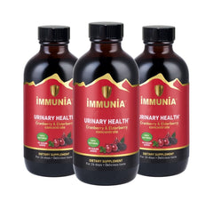 Immunia cranberry-elderberry concentrate bottle close-up showing natural ingredients for daily urinary health support.