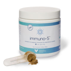 Immuno-5 powder sprinkled on cat food to support immune health.