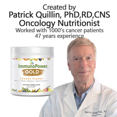 ImmunoPower Gold orange-scoop in hand for convenient powder intake