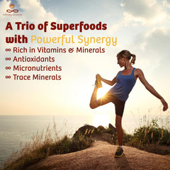Infinity Greens turmeric capsules close-up, raw vegan formula visible.