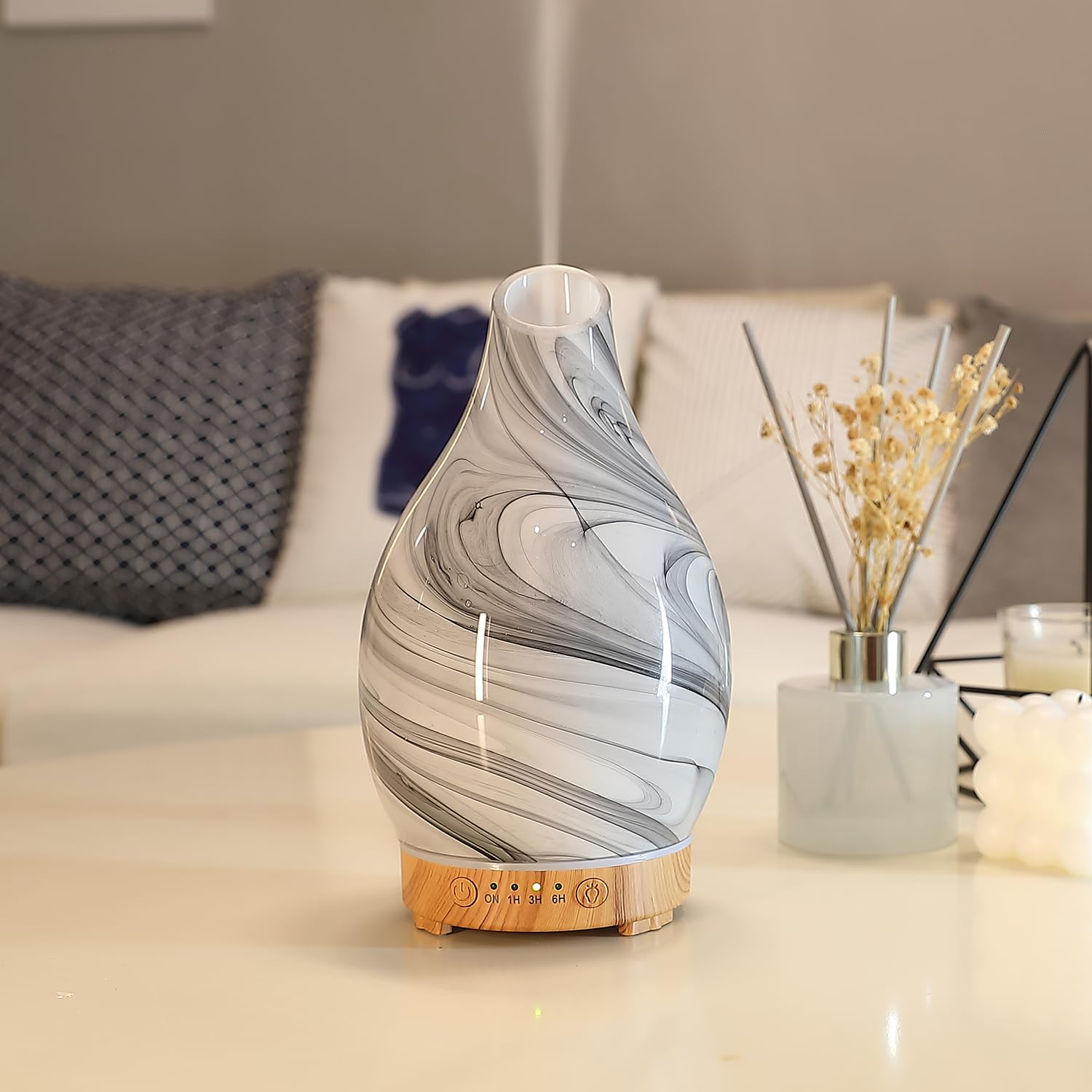 Inrorans essential oil diffuser art glass upper section enhances decor and aroma.