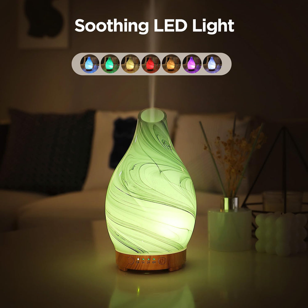 Inrorans diffuser with wood grain base blends into home interiors.
