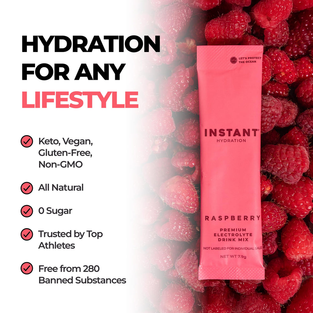 Instant Hydration glass with raspberry drink ready to sip.