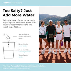 Instant Hydration open-pack beside a glass of water ready to mix