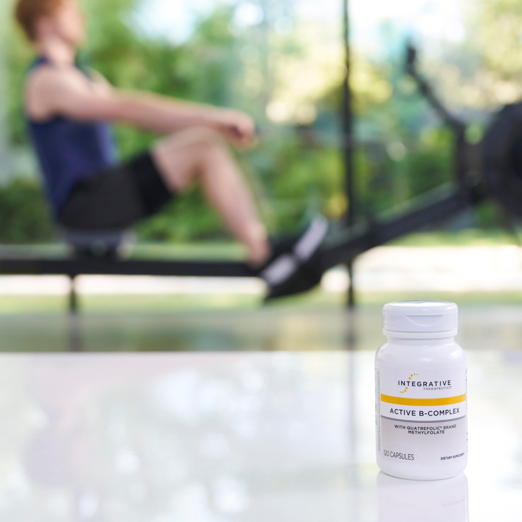 Integrative Therapeutics Active B-Complex capsules arranged on a clean desk for brain focus
