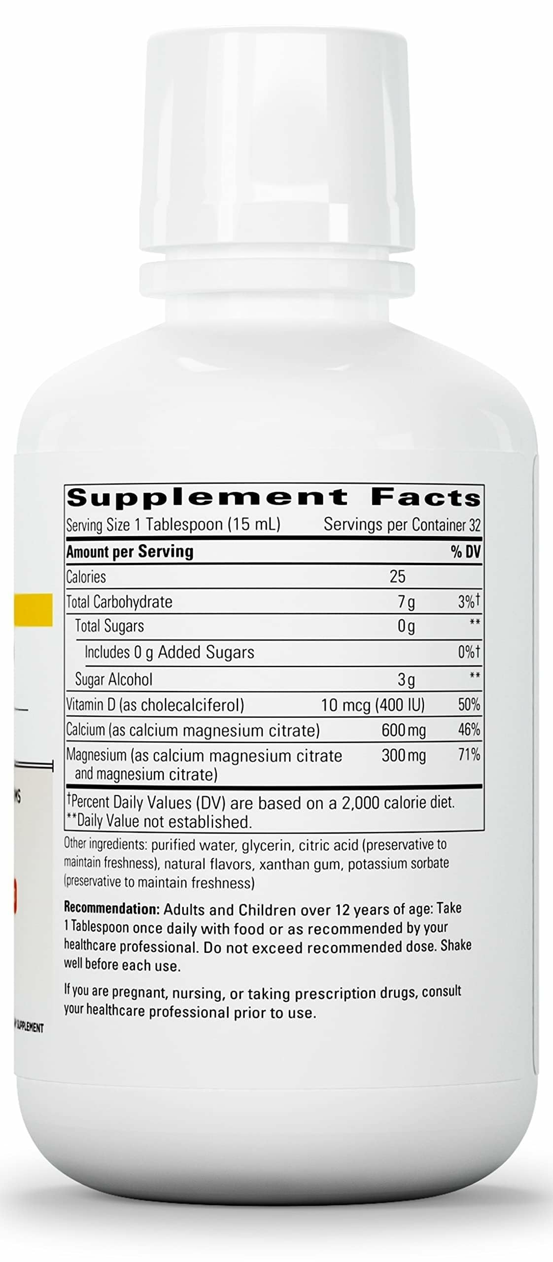 Close-up pouring Integrative Therapeutics liquid calcium magnesium to show texture.