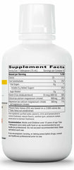 Close-up pouring Integrative Therapeutics liquid calcium magnesium to show texture.