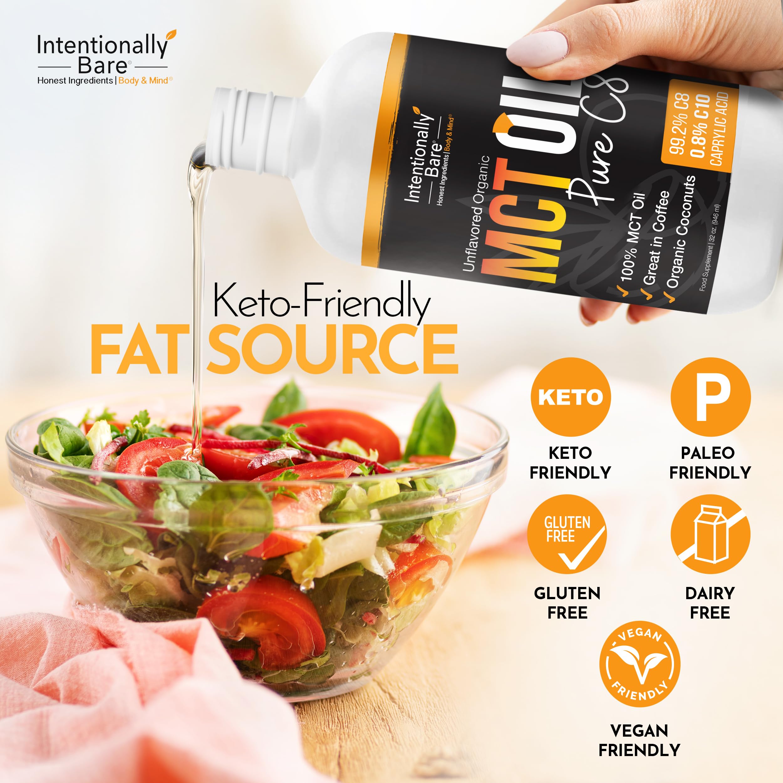 Intentionally Bare MCT oil clear liquid pouring from bottle.