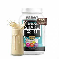 INVIGOR8 Superfood Shake vanilla in glass shows creamy texture and flavor.
