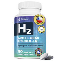 Invigorated Water hydrogen tablets dissolving in water for easy hydration.
