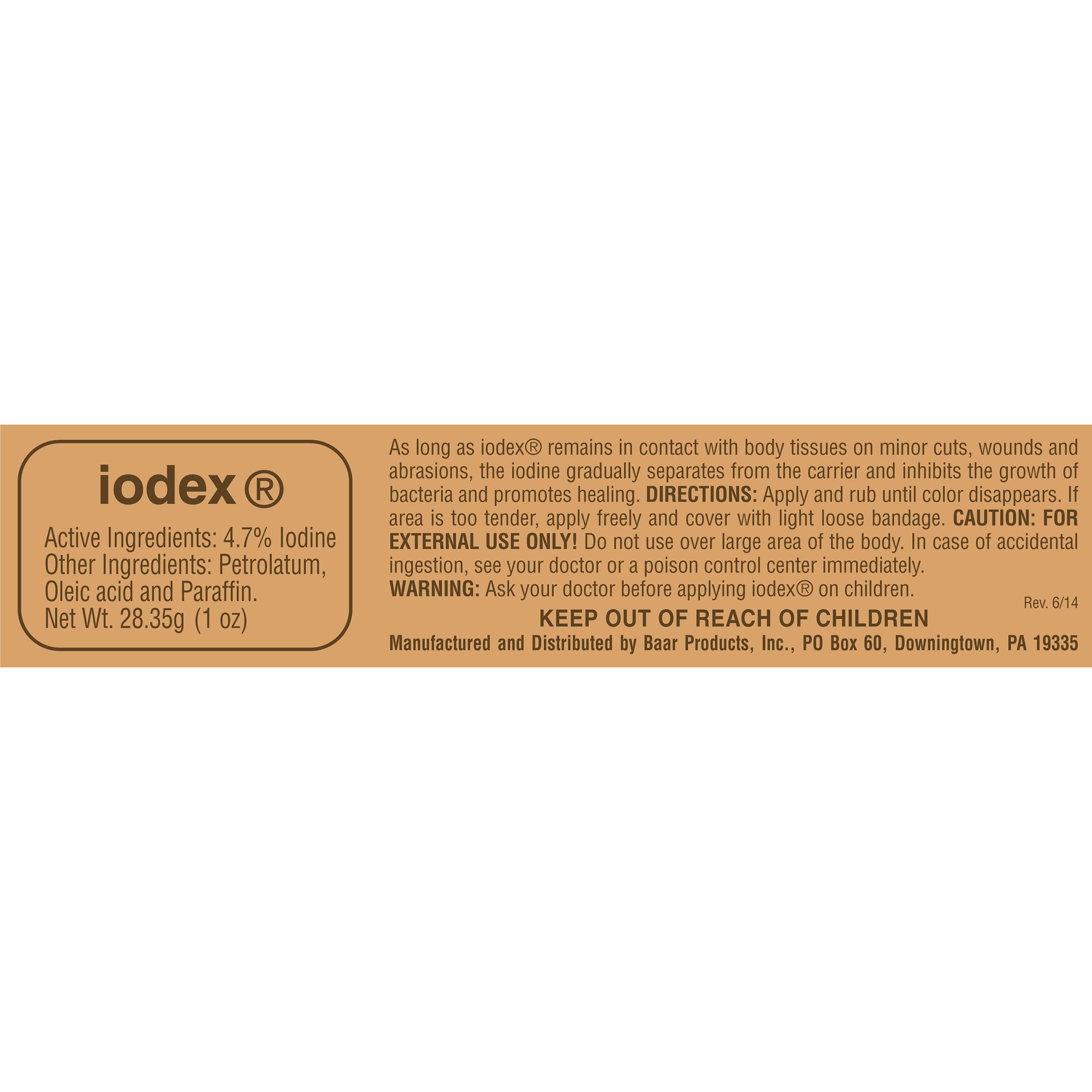 Closeup of IODEX bottle, classic iodine salve for everyday minor injuries.