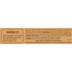 Closeup of IODEX bottle, classic iodine salve for everyday minor injuries.