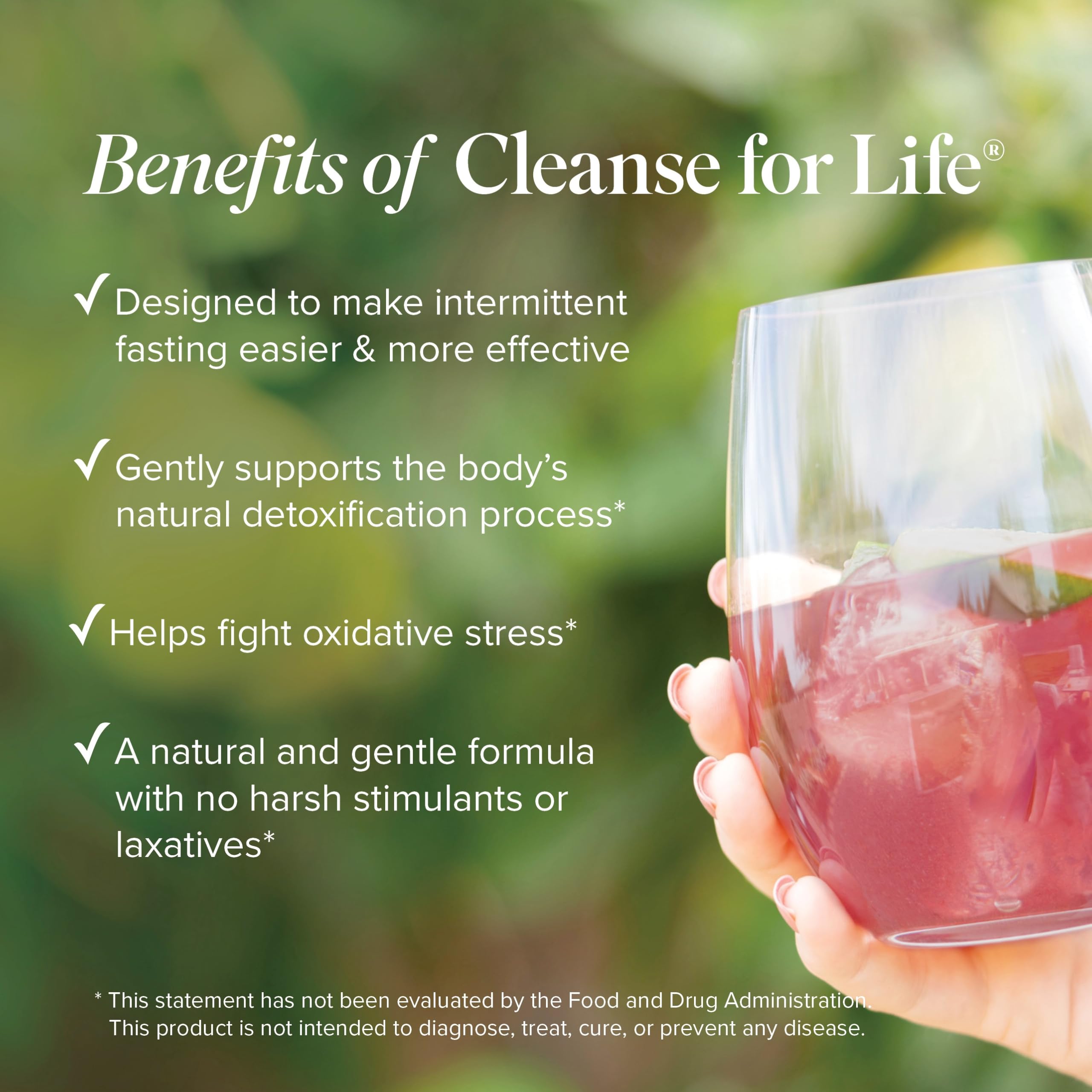 Isagenix Cleanse for Life powder swirling in a glass of water